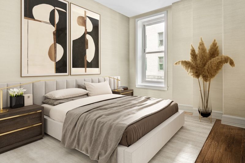 Second bedroom with upholstered bed at 1 Central Park South 701, Central Park South — photo 6 of 7