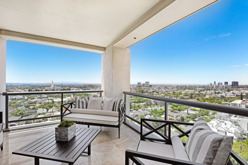 Living room with wraparound views at 10724 Wilshire Boulevard 1607, Park Wilshire