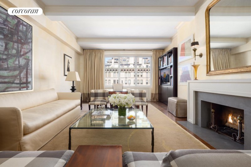 Living room fireplace wall at 1095 Park Avenue 15D, Carnegie Hill — photo 2 of 9