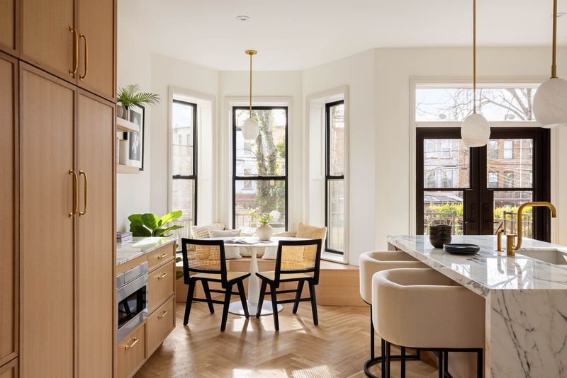 Eat-in kitchen with doors to the terrace at 1102 Prospect Place, Crown Heights — photo 4 of 9