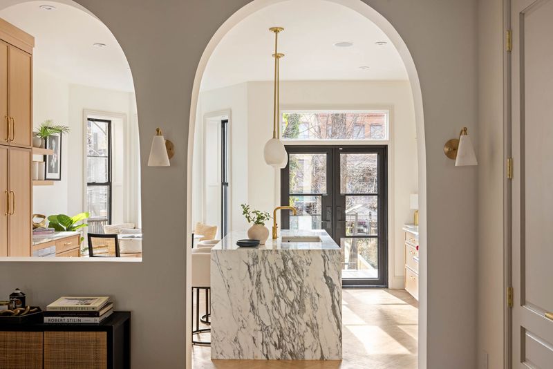 Arched passage into the kitchen at 1102 Prospect Place, Crown Heights — photo 6 of 9