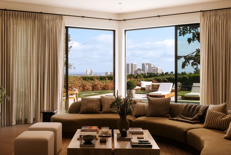 Living room with city views at 1122 La Altura Road, Beverly Hills — photo 3 of 7