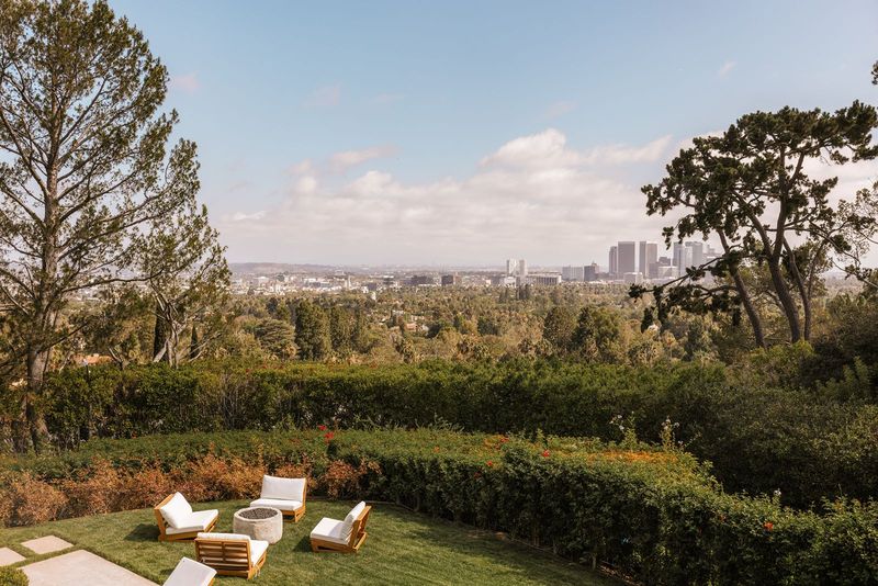 Lawn terrace toward Century City at 1122 La Altura Road, Beverly Hills — photo 6 of 7