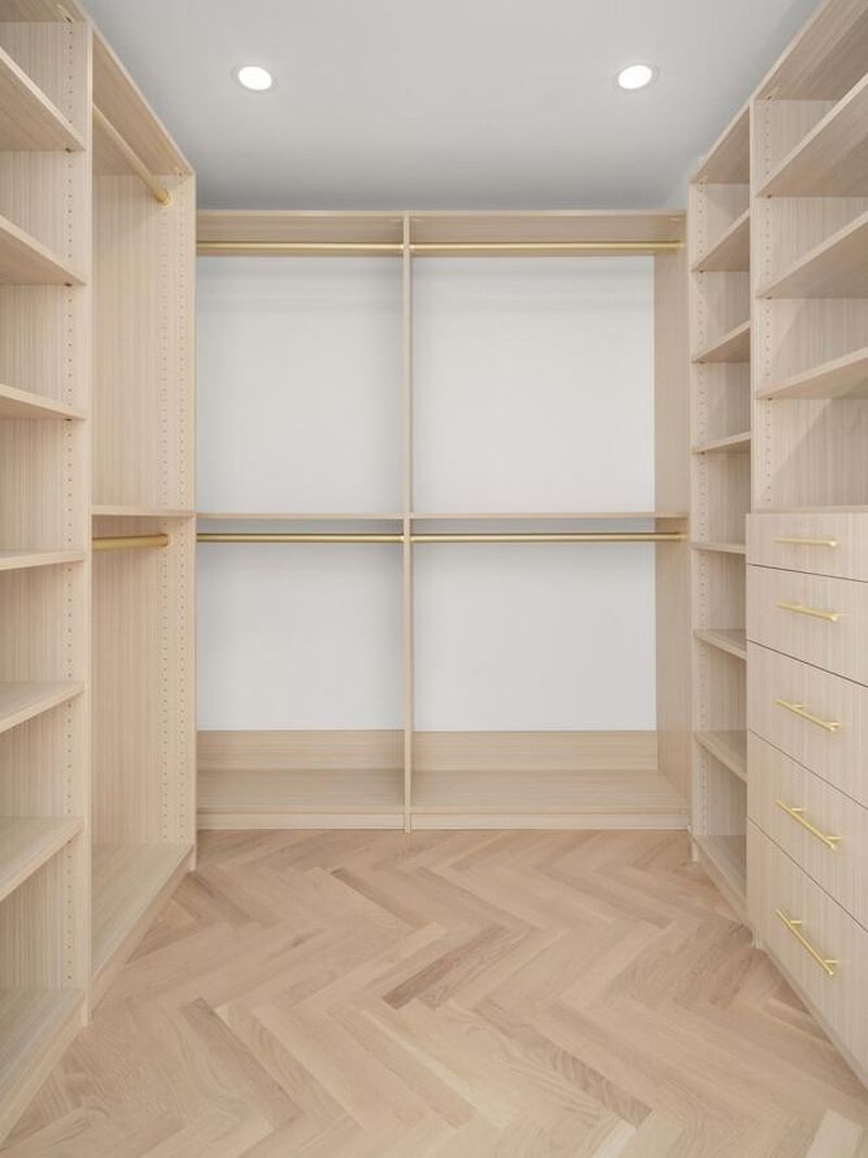 Custom white-oak walk-in closet at 1200 Fifth Avenue 15A, Carnegie Hill — photo 11 of 13