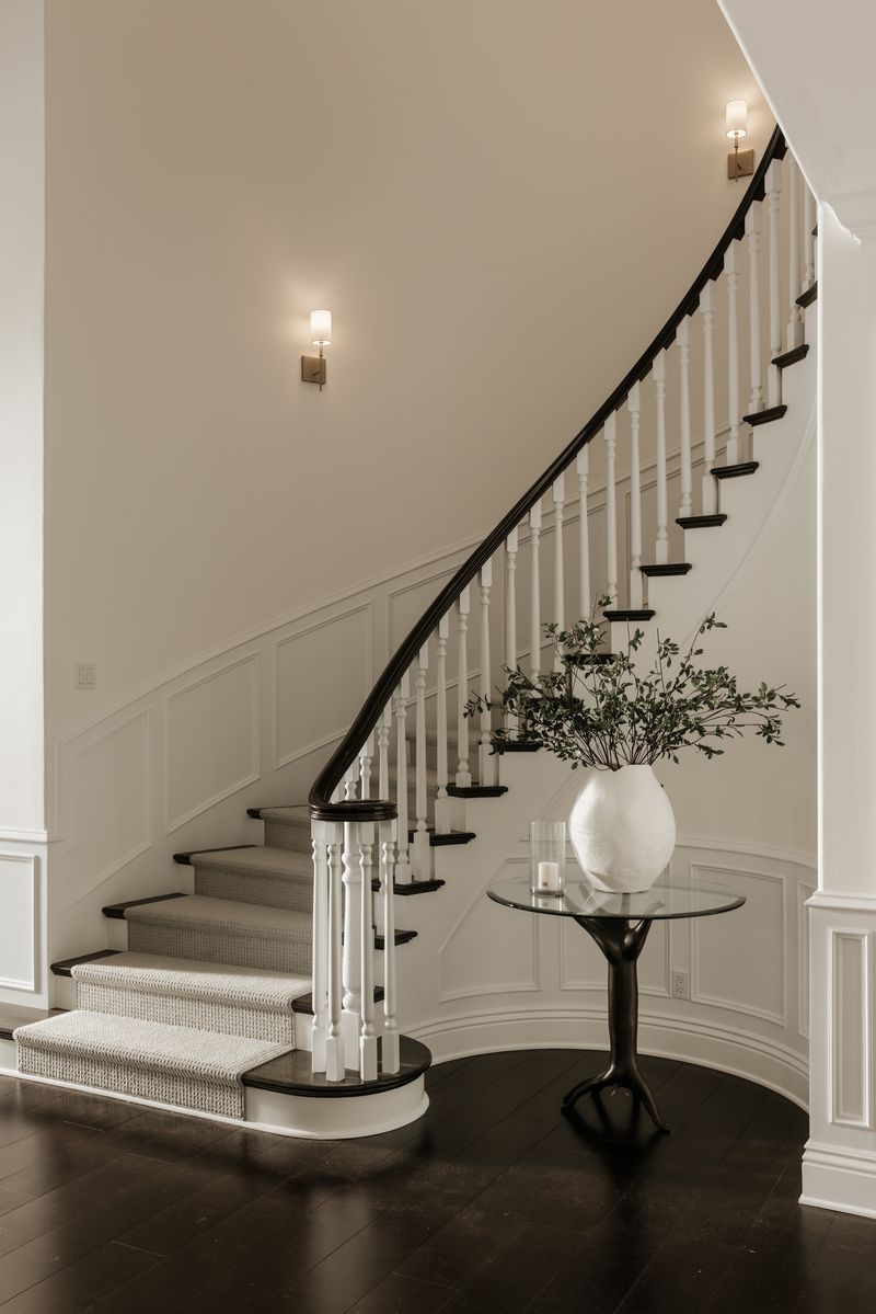 Curved staircase at 1228 Amalfi Drive, Pacific Palisades — photo 9 of 12