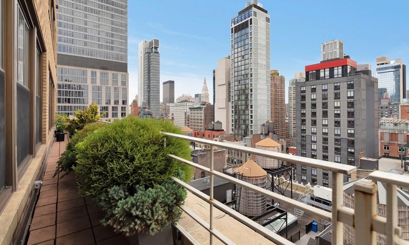 Terrace with skyline view at 130 West 30th Street 18A, Chelsea / NoMad — photo 4 of 8