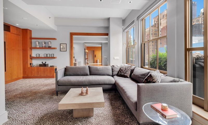 Den and sitting room at 130 West 30th Street 18A, Chelsea / NoMad — photo 6 of 8