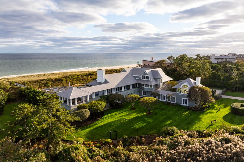 The shingled residence and lawns above the dunes at 137 Murray Lane, Southampton Village — photo 2 of 10