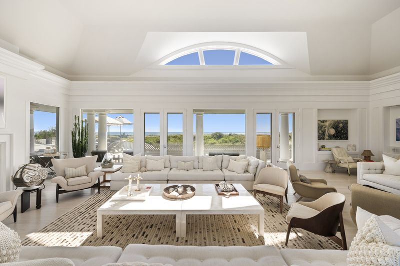 Second-floor living room with water views on every side at 137 Murray Lane, Southampton Village — photo 4 of 10