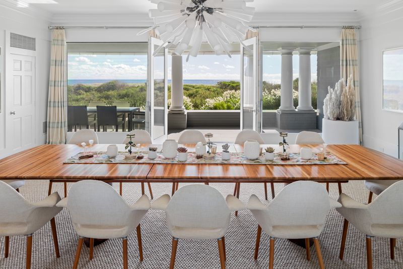 Formal dining room opening to the terrace at 137 Murray Lane, Southampton Village — photo 5 of 10