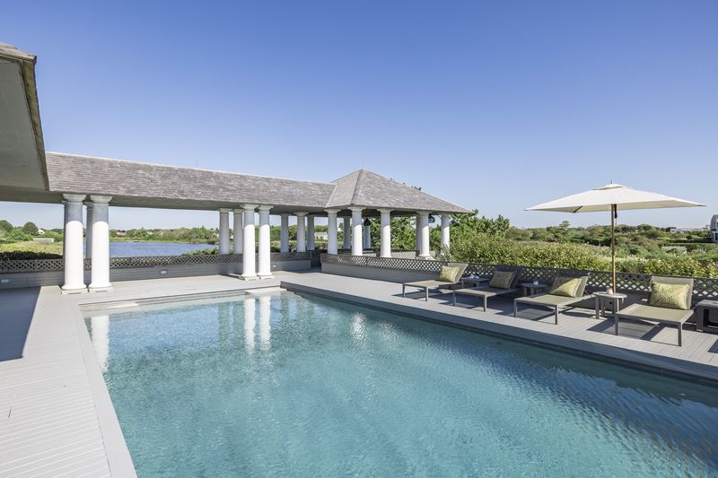 Pool deck and pavilion at 137 Murray Lane, Southampton Village — photo 9 of 10