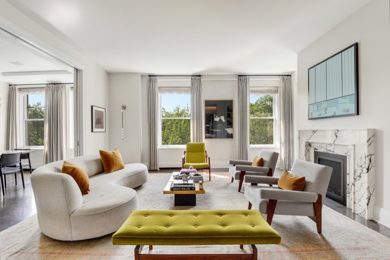 Living room with marble fireplace and park views at 137 Riverside Drive 4BC, Upper West Side