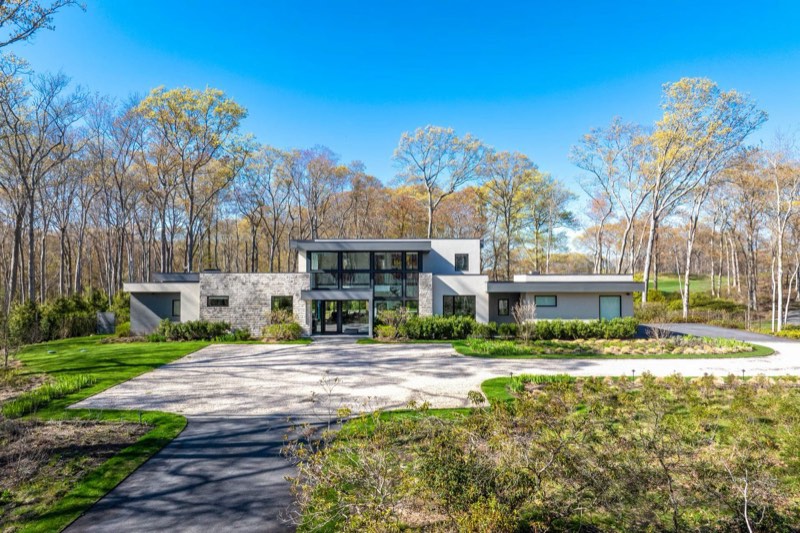 Modern house with heated pool at 14 Fairway Court Sag Harbor along Noyac Golf Club