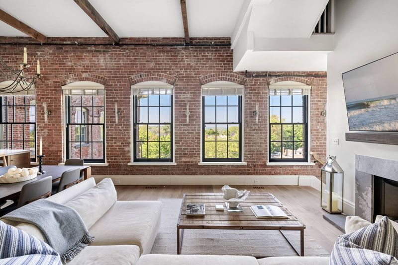 Living area treetop views at Watchcase, 15 Church Street PH-402, Sag Harbor Village — photo 5 of 8