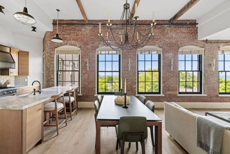 Kitchen and dining, beamed ceiling at Watchcase, 15 Church Street PH-402, Sag Harbor Village — photo 6 of 8