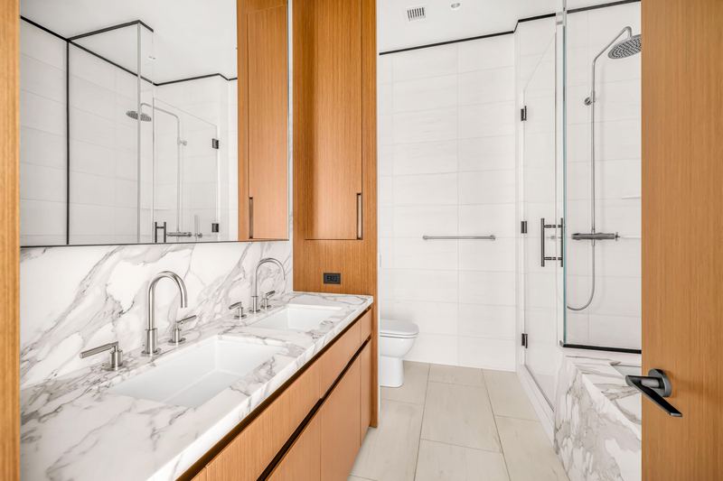 The primary bath at 15 East 30th Street #33D, NoMad — photo 4 of 10