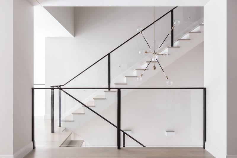 Interior stair with black rail at 150 Charles Street M10, West Village — photo 11 of 12