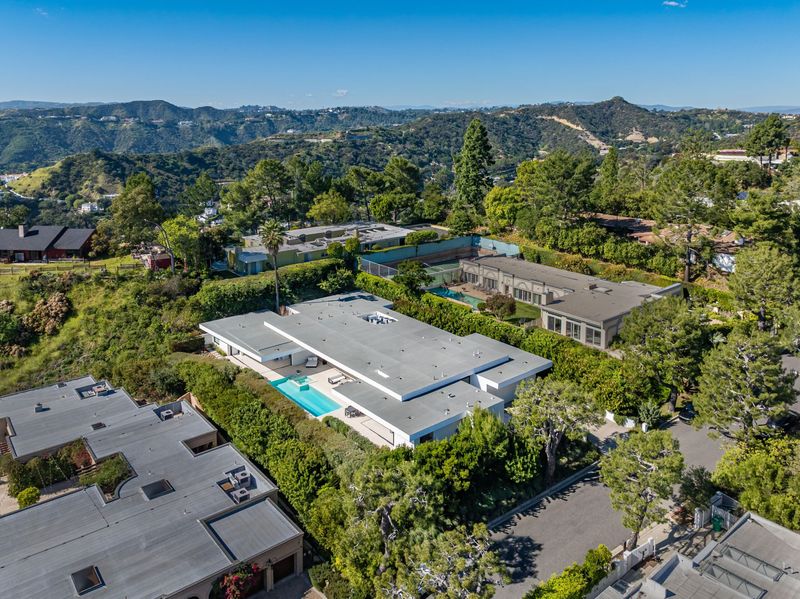 Wide aerial toward the mountains at 1535 Carla Ridge, Trousdale Estates — photo 10 of 10