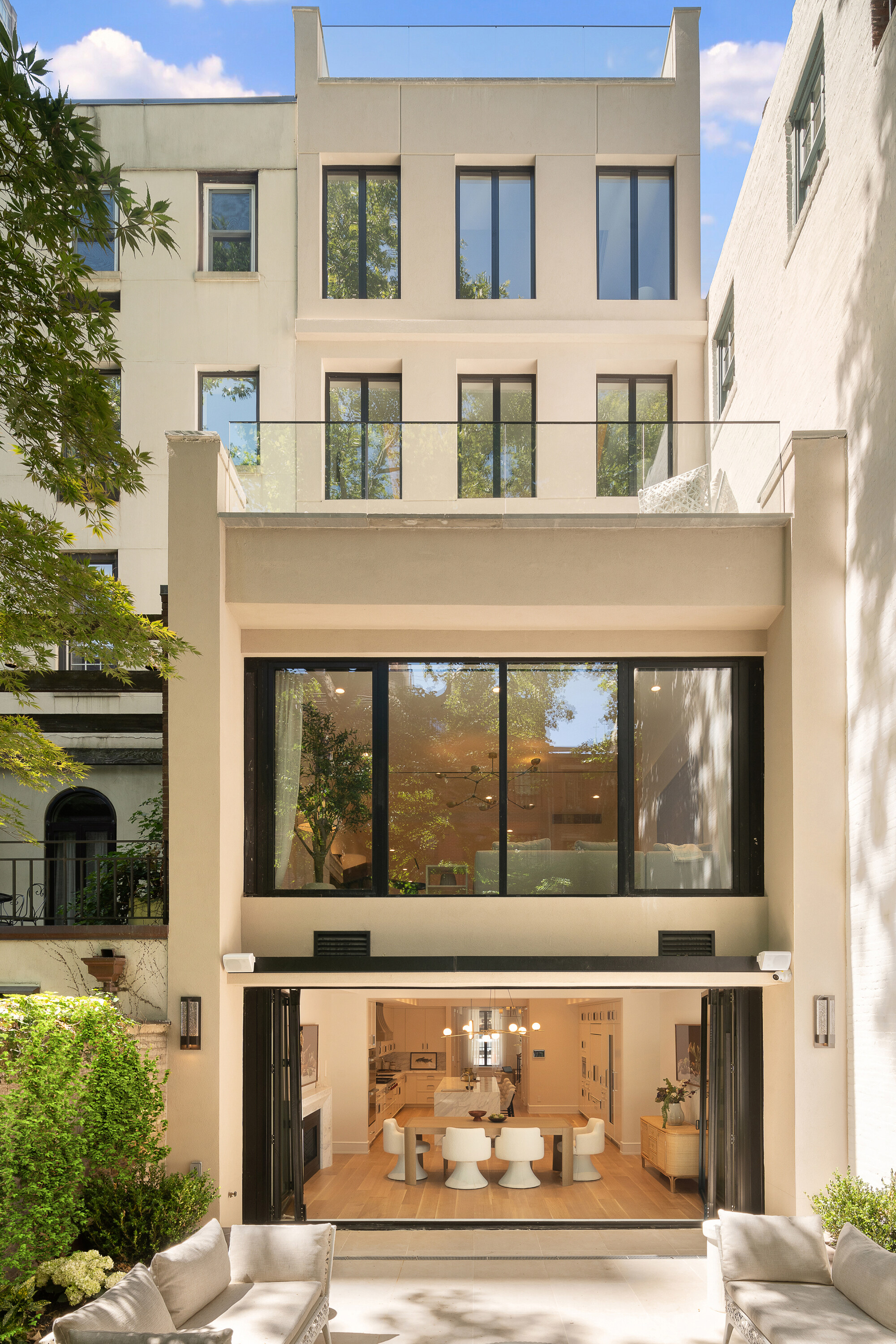 rear garden facade of 165 East 64th Street
