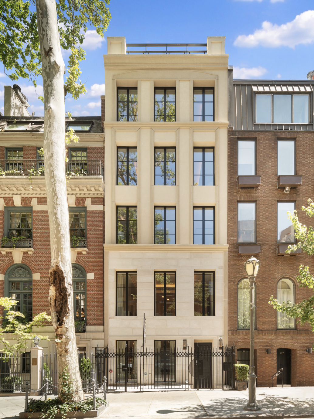 limestone street facade of 165 East 64th Street