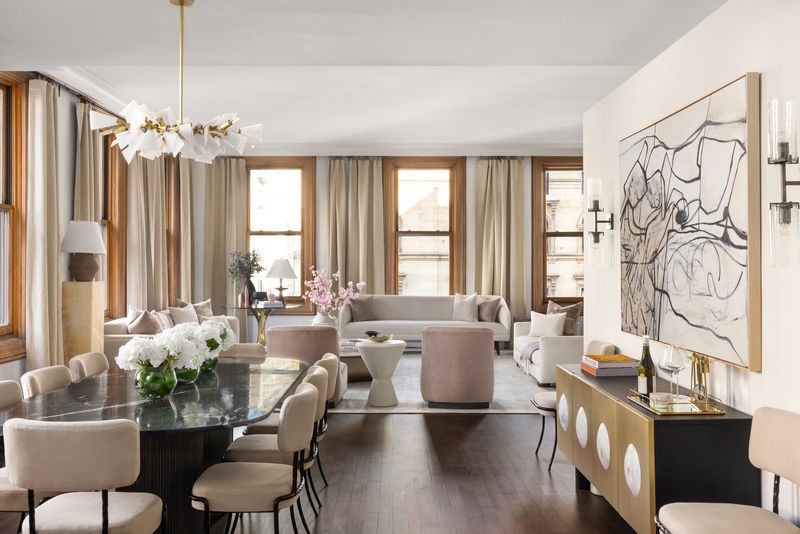 Dining area under a sculptural chandelier at 170 Fifth Avenue, Unit 5, Flatiron — photo 5 of 10