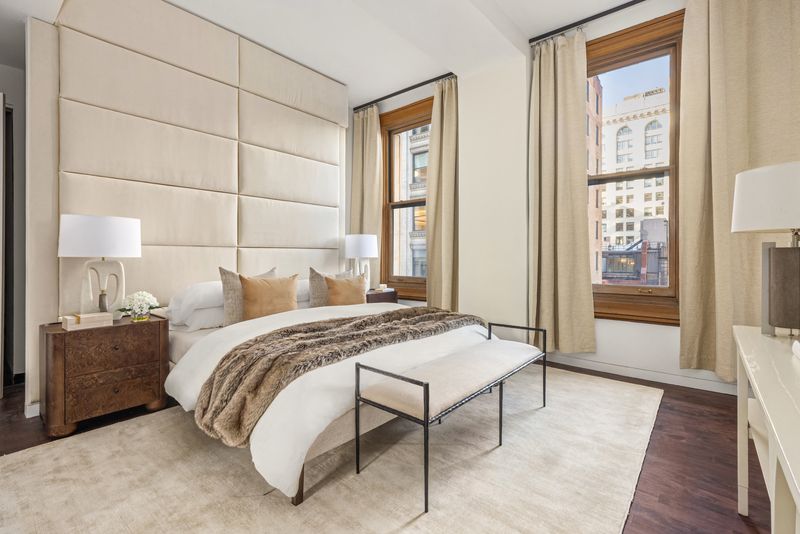 Primary bedroom with an upholstered wall at 170 Fifth Avenue, Unit 5, Flatiron — photo 8 of 10