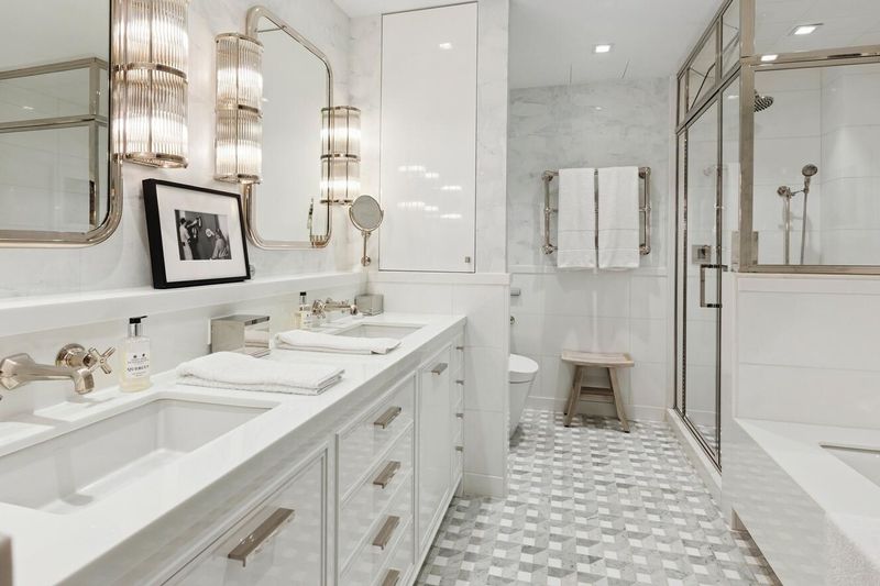 Primary bath with double vanity, steam shower and soaking tub at 170 East End Avenue 3J, Upper East Side — photo 7 of 9