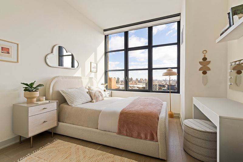 Second bedroom with skyline window at 180 Front Street 11E, DUMBO — photo 8 of 9