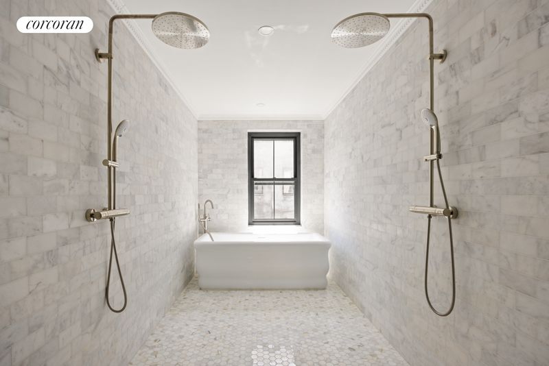 Primary bath with twin rainfall showers and soaking tub at 198 Putnam Avenue, Bedford-Stuyvesant — photo 8 of 10