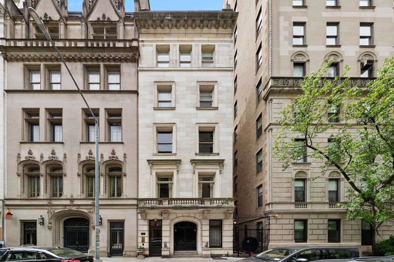 The restored mansion facades along East 80th Street at 2 East 80th Street #7, Upper East Side