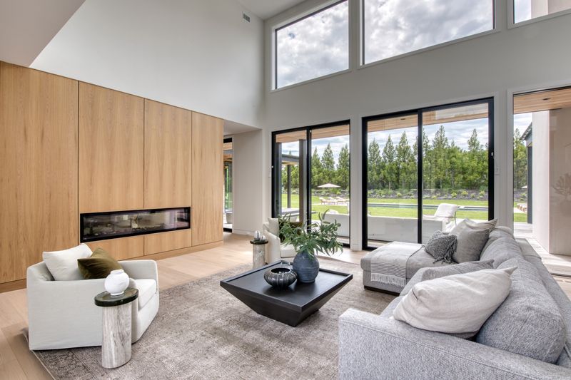 Living room with linear fireplace at 204 Head of Pond Road, Water Mill — photo 4 of 10