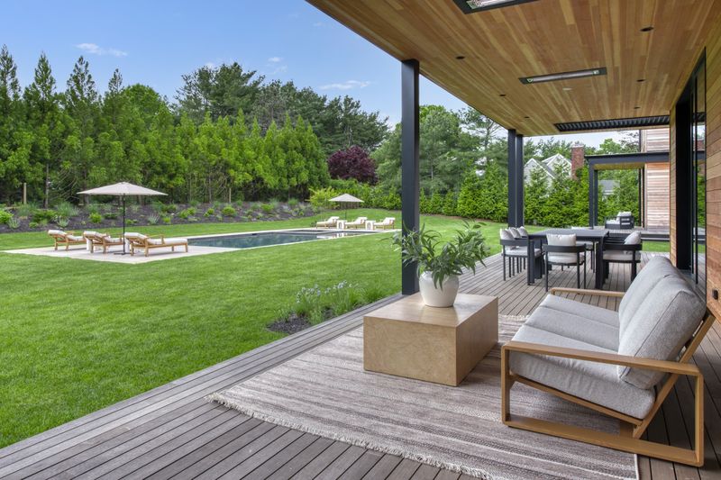 Covered outdoor living at 204 Head of Pond Road, Water Mill — photo 8 of 10