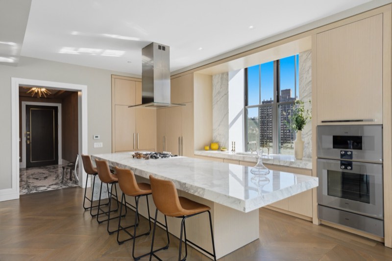 kitchen island, light millwork, ovens