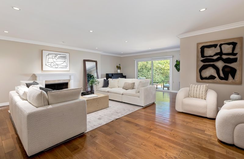 Living room with fireplace and hardwoods at 2302 Duxbury Circle, Beverlywood — photo 2 of 8