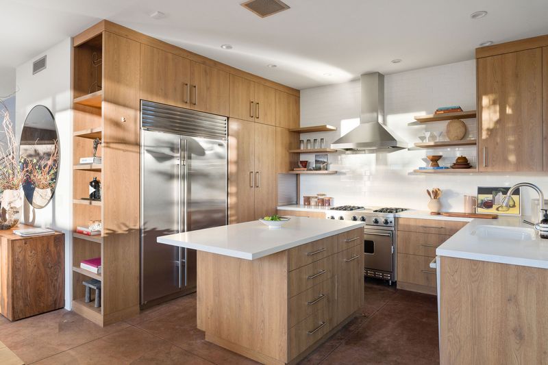 Kitchen with wood cabinetry and a large island at 2324 Boone Avenue, Venice — photo 8 of 8