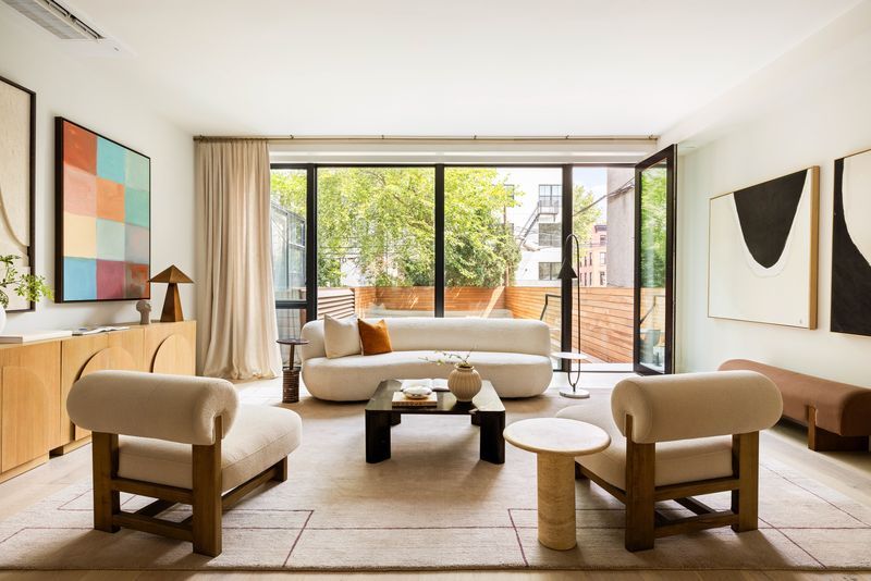 Living room opening to the backyard at 235 Sackett Street #1, Carroll Gardens — photo 3 of 12
