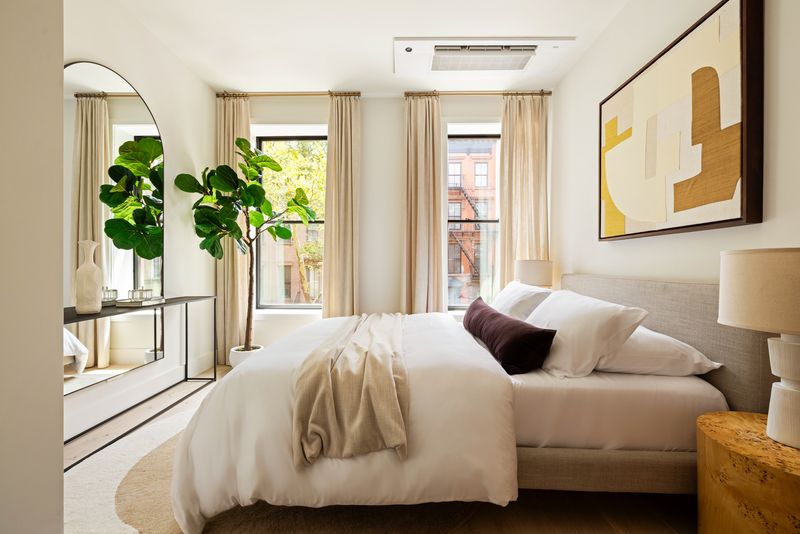 Bedroom with windows to the street at 235 Sackett Street #1, Carroll Gardens — photo 9 of 12