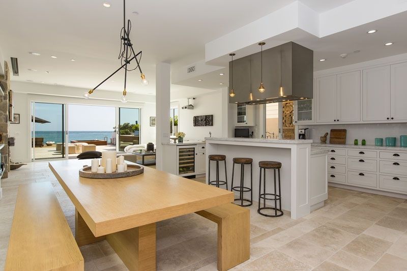 Kitchen and dining with island at 23812 Malibu Road, Malibu — photo 6 of 8