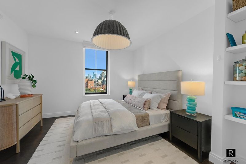 Secondary bedroom with skyline view at 250 West Street 9JK, Tribeca — photo 9 of 12
