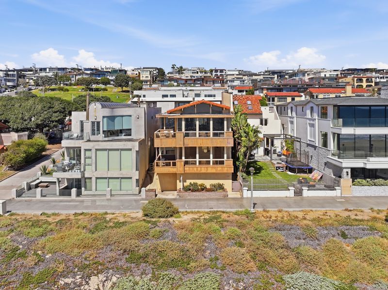 Beachfront exterior elevation along The Strand at 2516 The Strand, Manhattan Beach — photo 6 of 8