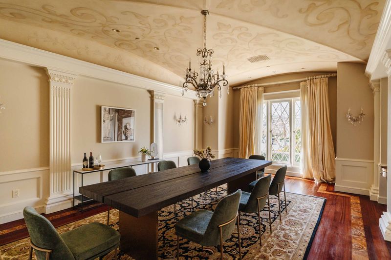 Formal dining room on dark hardwood at 25242 Prado Del Misterio, Calabasas — photo 7 of 8