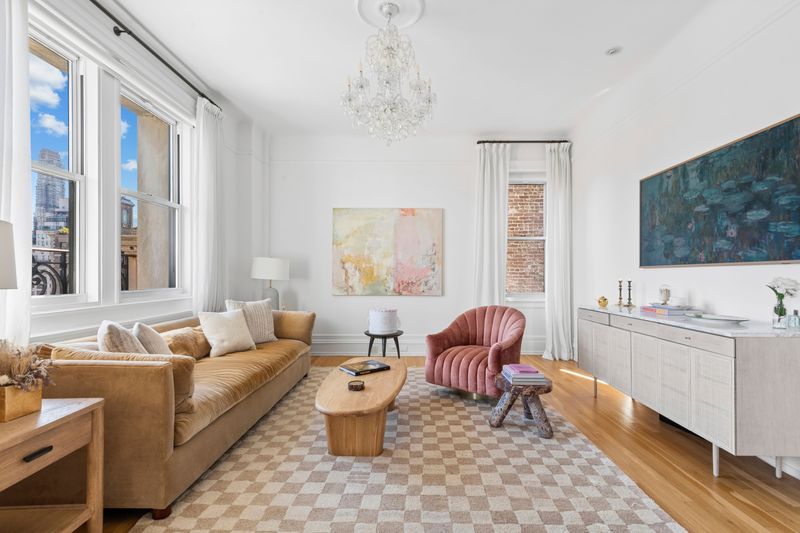 Living room with 11-foot ceilings at 26 East 63rd Street 11F, Upper East Side