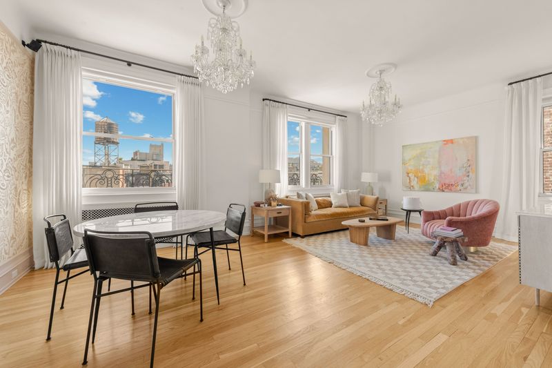 Living and dining room at 26 East 63rd Street 11F, Upper East Side — photo 2 of 9