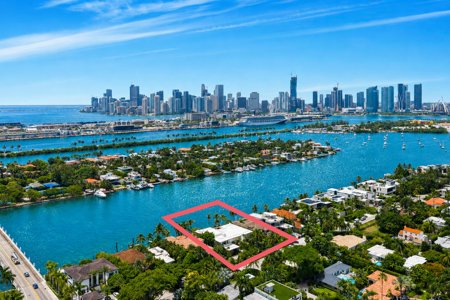 Aerial of 270 South Hibiscus Drive, property outlined, Miami skyline