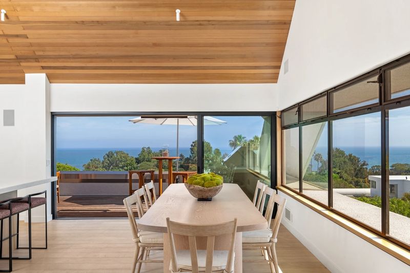 Dining area facing the ocean at 27553 Pacific Coast Highway, Malibu — photo 5 of 6