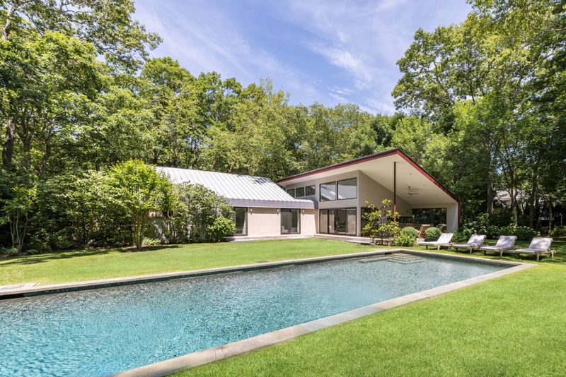 Heated saltwater pool and lawn at 3 Whale Rock Lane, East Hampton
