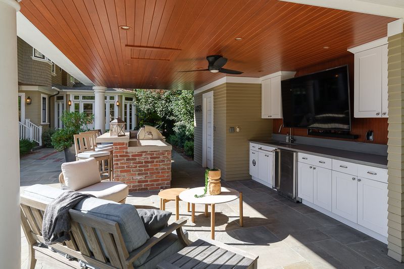 The covered cabana, with an outdoor kitchen and lounge seating at 303 Markham Place, Pasadena — photo 7 of 12