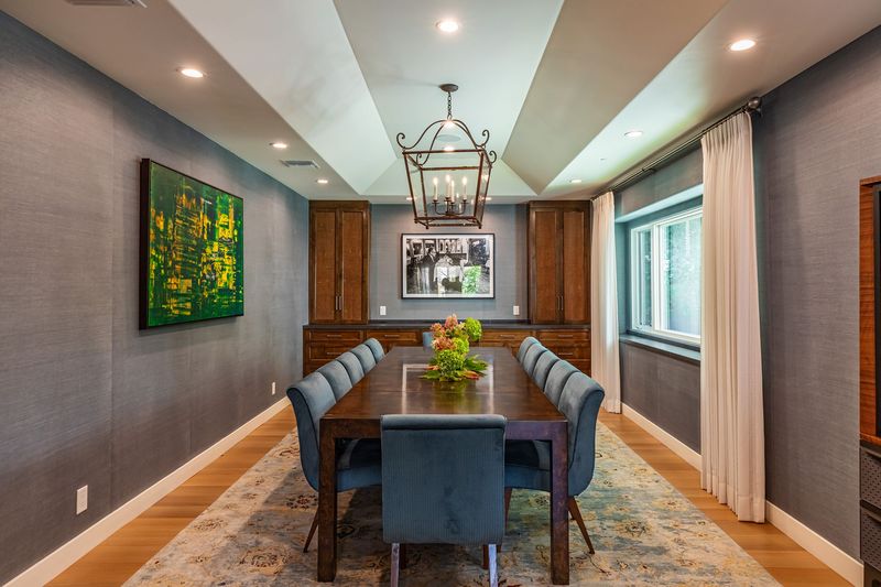 The formal dining room under a lantern pendant and a tray ceiling at 3101 Fryman Road, Studio City — photo 6 of 12