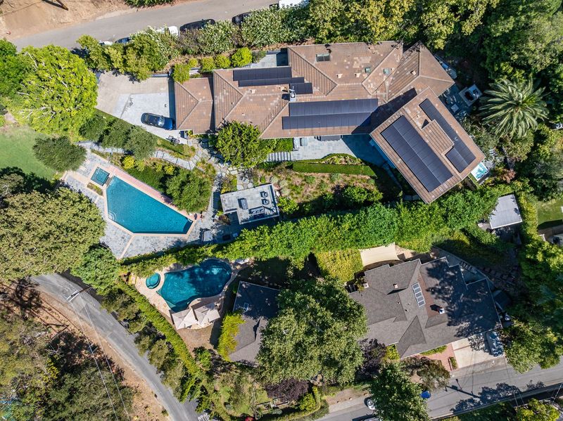A top-down aerial of the house, the pool, the spa and the grounds at 3101 Fryman Road, Studio City — photo 9 of 12