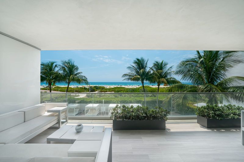 Terrace view over the palms, dunes and Atlantic at Beach House 200, 321 Ocean Drive, Miami Beach